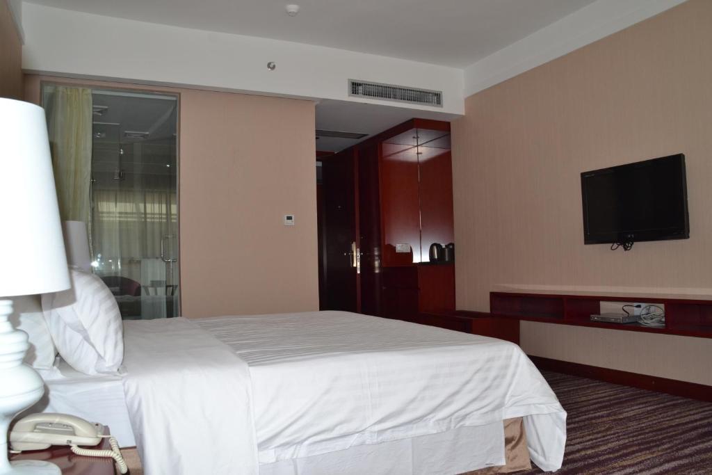 Elite Garden Hotel Янгшуо Стая снимка
